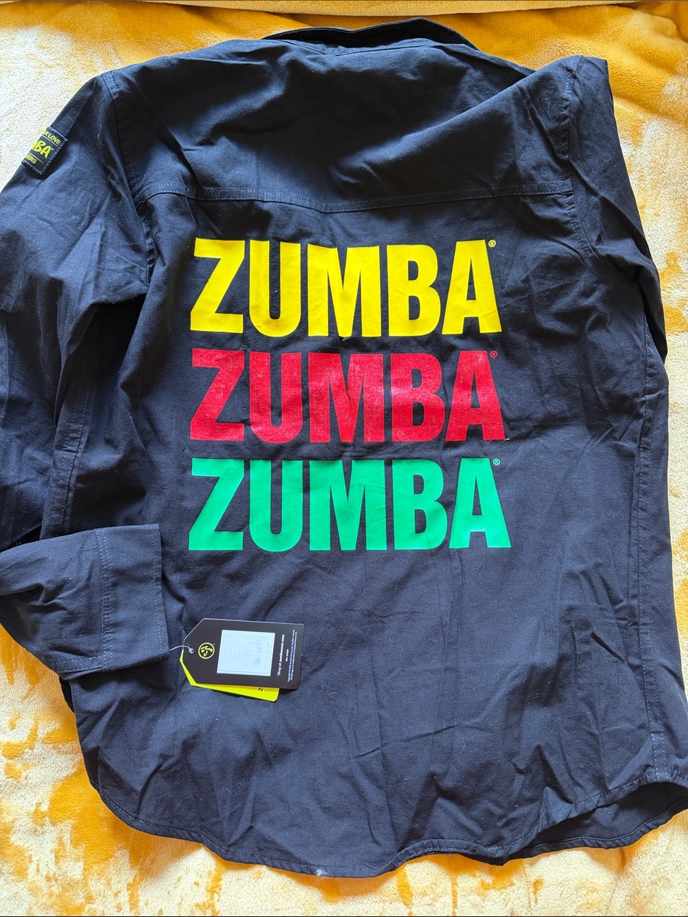Zumba Fitness Black Shirt with Green and Yellow Logo Accents